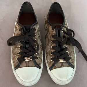 Size 36 Coach shoes with logo prints.